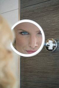  A HiB Magnifying Mirror available from BATHLINE.